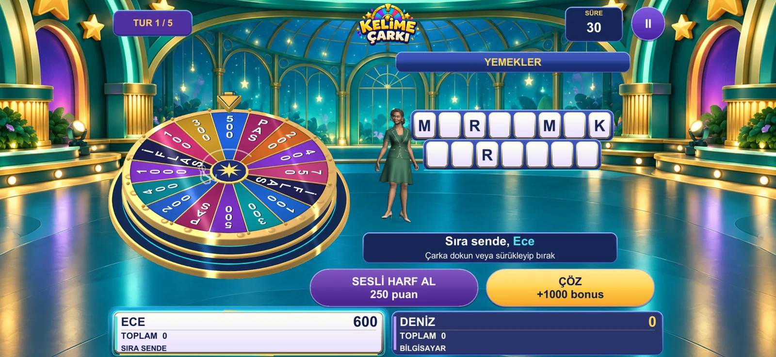 Kelime Çarkı in another colorful studio with a host and word board.